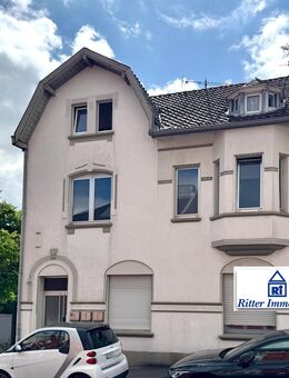 Ritter Immobilien e.K.: Gepflegtes MFH mit Innenhof & Doppelgarage in zentraler Lage von Kohlscheid! - Herzogenrath