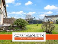 Gepflegtes Endreihenhaus mit großem Garten und Ausbaureserve im Dachboden und Carportmöglichkeit in beliebter Lage - Norderstedt