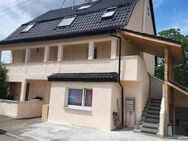 Solides Zweifamilienhaus mit Modernisierung - zentrale Lage und sichere Mieteinnahmen - Eningen (Achalm)