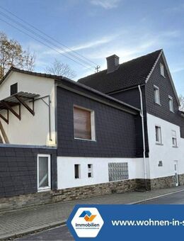 Ein-/Zweifamilienhaus mit sonnigem Grundstück in Bestlage von Netphen! - Netphen