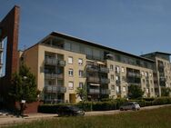 Attraktive Kapitalanlage - Vermietete 2-Raum Wohnung mit Blick ins Grüne, Balkon, Fahrstuhl & Tiefgaragenstellplatz - Rostock