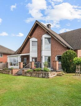 Familienidylle trifft Kapitalanlage - vielseitiges Wohnhaus mit Potenzial in Ibbenbüren-Laggenbeck - Ibbenbüren