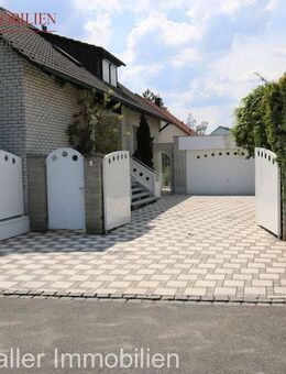 Exklusives Zweifamilienhaus mit 3 Einheiten, Erdwärmepumpe & Wellnessbereich in ruhiger Lage - Seukendorf