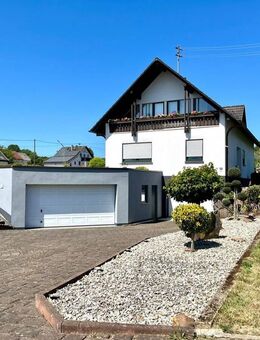 TOP gepflegtes Einfamilienhaus mit Garten und Garage in guter Lage von Losheim am See- Mitlosheim - Losheim (See)