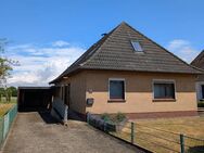 Familienfreundlicher Bungalow mit Wintergarten und großem Garten! Wohnen in begehrter Lage von Seckenhausen - Stuhr