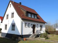 Einfamilienhaus mit schönem Garten in Mössingen, ebenes Grundstück in ruhiger zentrumsnaher Lage mit großer Garage - Mössingen