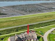 Direkt hinter dem Naturerbe Wattenmeer - landschaftstypisches Reihenmittelhaus unter Reet! - Nordstrand