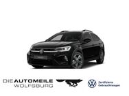 VW Taigo, 1.5 TSI OPF R-Line, Jahr 2024 - Wolfsburg