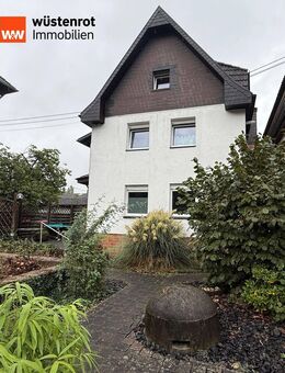Ein Zweifamilienhaus zum Wohlfühlen, mit großem Garten und Garage in Unkel - Unkel