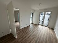 Erstbezug mit Fernblick - Ruhige, helle 2-Zimmer-Wohnung mit großem SW-Balkon und TG - Trostberg