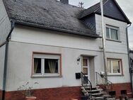 Freistehendes, ruhig gelegenes Einfamilienhaus mit Garage und Garten - Bundenbach
