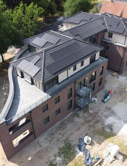 IMMOBILIEN GUMNIOR präsentiert: Neubau! Moderne Obergeschosswohnung mit Loggia in Emsbüren - Emsbüren