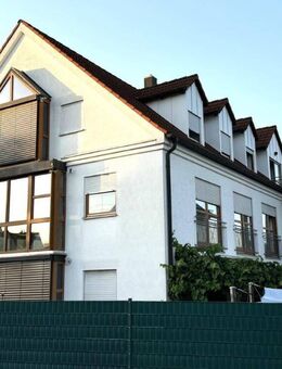 Helle Obergeschosswohnung in 9-Familienhaus - Neusäß