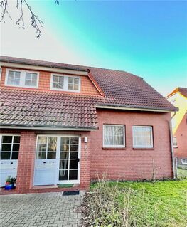 Invest - vermietete OG Wohnung mit West - Balkon plus Carport