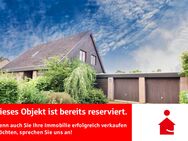 Reserviert! Vielseitiges Wohnhaus mit zwei Garagen - Wiefelstede