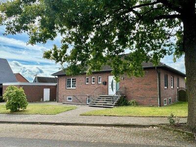 Gepflegter Winkelbungalow mit Garage in zentraler Lage