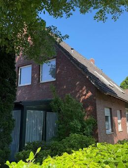 Zweifamilienhaus mit Garten und Garage in Zetel zu verkaufen. - Zetel