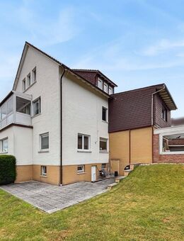 Vielseitiges Wohn- und Geschäftshaus mit Praxis, Wintergarten und großem Garten in Anspach - Neu Anspach
