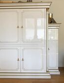 Wohnzimmerschrank Hochglanz weiß mit Goldapplikationen in 53173