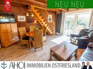 Pferdefreunde aufgepasst! Gepflegtes Reihenmittelhaus in direkter Kanallage auf einer Reitanlage - Krummhörn