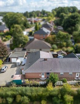 Solider Mietbungalow mit 3 Wohnungen, Garten und Garagen | zentral in Syke-Barrien - Syke