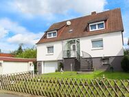 Provisionsfrei - Geräumiges Einfamilienhaus mit Baugrundstück in ruhiger Lage in Niestetal-S. - Niestetal