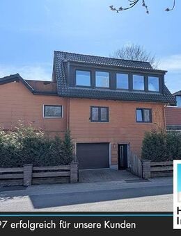 Mehrfamilienhaus mit Halle, Garagen und Ausbaupotenzial - Springe