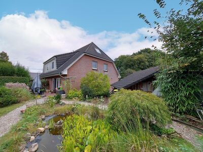 Doppelhaushälfte (vermietet) mit schönem Garten in ruhiger Lage (Ortsteil Bokelholm)