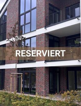 Wohnen am Norder Tief: Schöne Erdgeschosswohnung mit Blick auf die Mühle! ERSTBEZUG - Norden