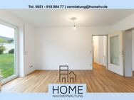 Trier-Quint: Lichtdurchflutete und komplett renovierte 2 ZKB-Wohnung mit ca. 50 m² WFL, Terrasse und eigener Garage - Trier