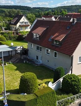 Liebevoll gestaltetes Zweifamilienhaus mit Einliegerwohnung und zwei Baugrundstücken in Niestetal - Niestetal