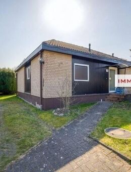 IMMOBERLIN.DE - Attraktiver Bungalow mit Wintergarten & Garage in ländlicher Lage vor den Toren Berlins - Ahrensfelde
