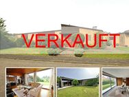 Architektonisch attraktiver Bungalow auf schönem Grundstück in Bedburg-Hau - Bedburg-Hau
