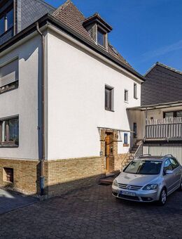 Attraktives Mehrfamilienhaus mit Garage, Lager, Apartment und angebautem Einfamilienhaus in Neheim! - Arnsberg