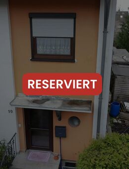 Reihenendhaus mit Potenzial: 5-Zimmer-Familienidylle mit Garten und Garage in Puchheim - Puchheim