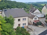 Familienhaus mit großem Inneren und kleinem Garten in ruhiger Lage. - Bettingen