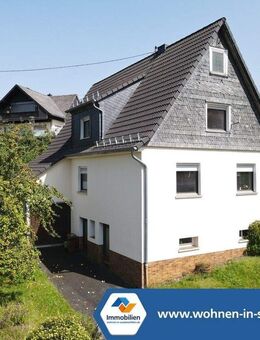 VR IMMO: Wohnen mit Potenzial- Charmantes Einfamilienhaus mit kleiner Halle/Scheune in Brachbach! - Brachbach