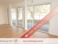 Exklusiv wohnen direkt an der Mosel - Hochwertige 2ZKB Erdgeschosswohnung mit Einbauküche, großer Terrasse & Tiefgaragenstellplatz! - Trier