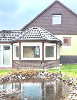 METEOR IMMOBILIEN : Schicke Gartenseite - vorne unauffällig - Emmerthal