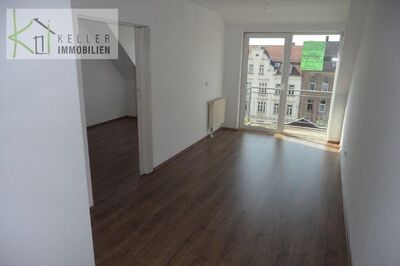 FÜR KAPITALANLEGER! - Vermietete kleine 2-R Wohnung mit sonnigem Balkon, MIT PKW-Einzelgarage!