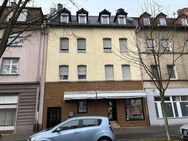 Mehrfamilienhaus mit Geschäftsräumen im EG und 10 Garagen - Frankfurt (Main)