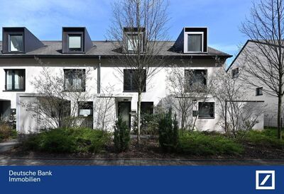 Moderne Eigentumswohnung mit Reihenhauscharakter - Ihr neues Zuhause in grüner Lage!