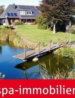 EFH mit Wintergarten, Garage, 2 Doppelcarports, PV-Anlage u. Gartenteich auf großem Grundstück - Ahrenshöft