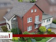 Großzügiges Zweifamilienhaus mit Balkon, Terrasse, Garten und 2 Tiefgaragen im idyllischen Loverich - Baesweiler