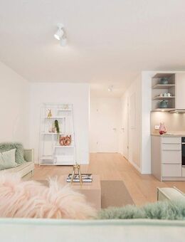 Mittendrin und doch ganz für sich – 2 Zimmer mit Balkon im 1. Obergeschoss. - Ladenburg