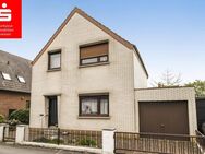 Hübsches Einfamilienhaus mit sonnigem Garten und Garage in familienfreundlicher Lage von Grohn - Bremen
