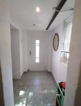 Charmantes Einfamilienhaus mit großzügiger Terrasse für unvergessliche Momente. - Kastellaun