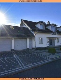 Exklusives Einfamilienhaus mit Doppelgarage und Wintergarten in Riegenroth - Riegenroth