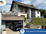 VR IMMO: Beeindruckendes Einfamilienhaus mit Einliegerwohnung, das keine Wünsche offen lässt! - Netphen