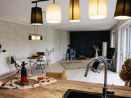 Wohnen wie im eigenen Haus - Eigentumswohnung mit Garten und Garage - Versmold